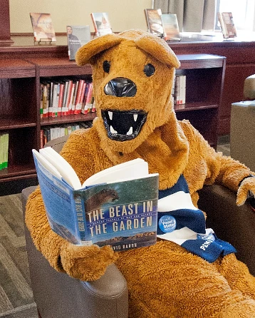 PSU mascot reading a book