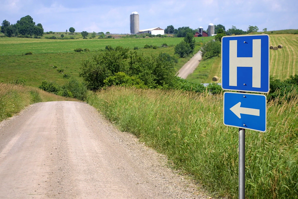 A hospital sign in a rural area