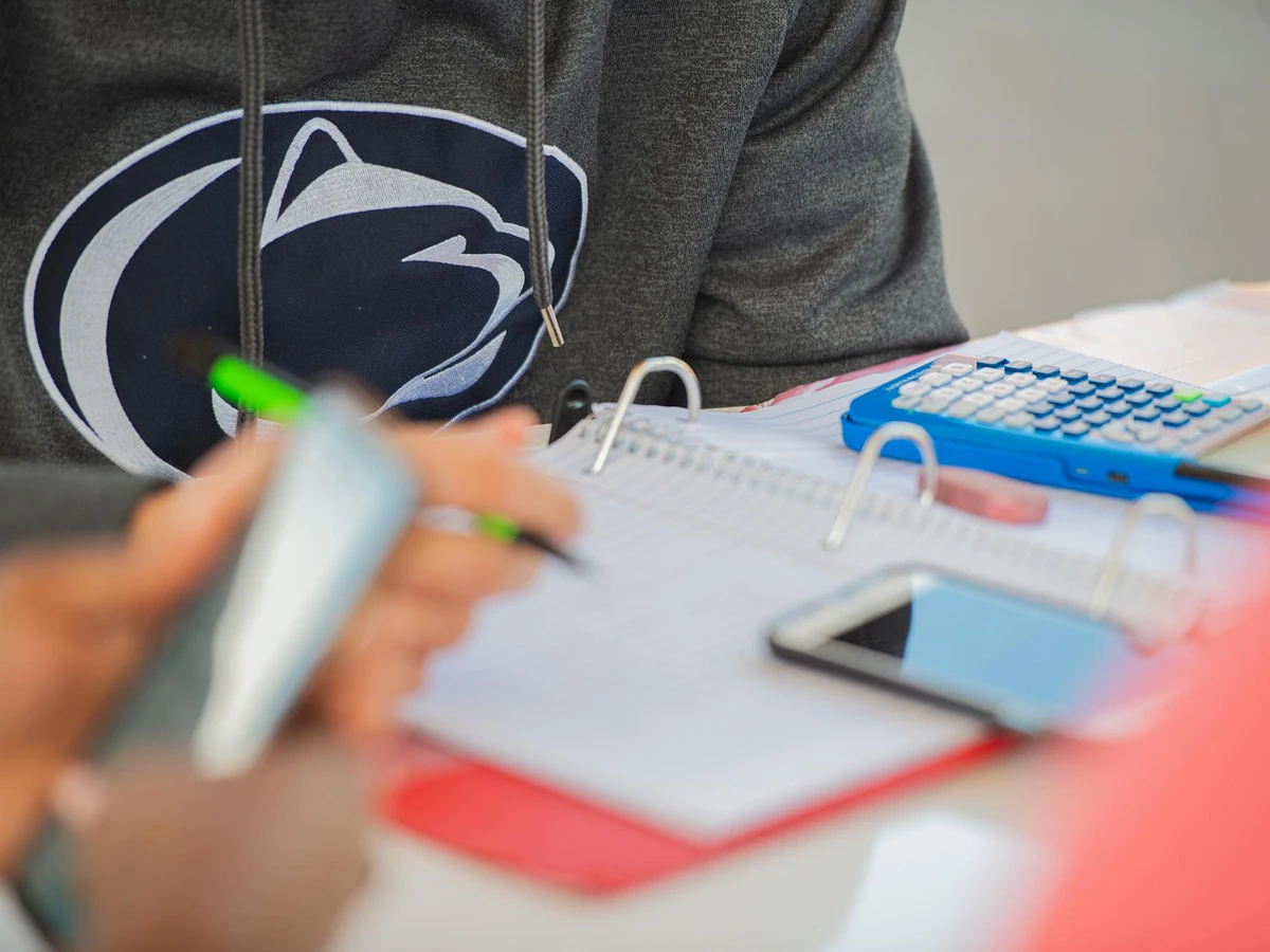Student taking notes