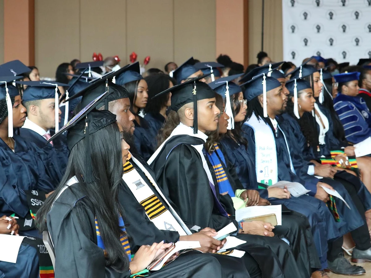 Students in graduation regalia.