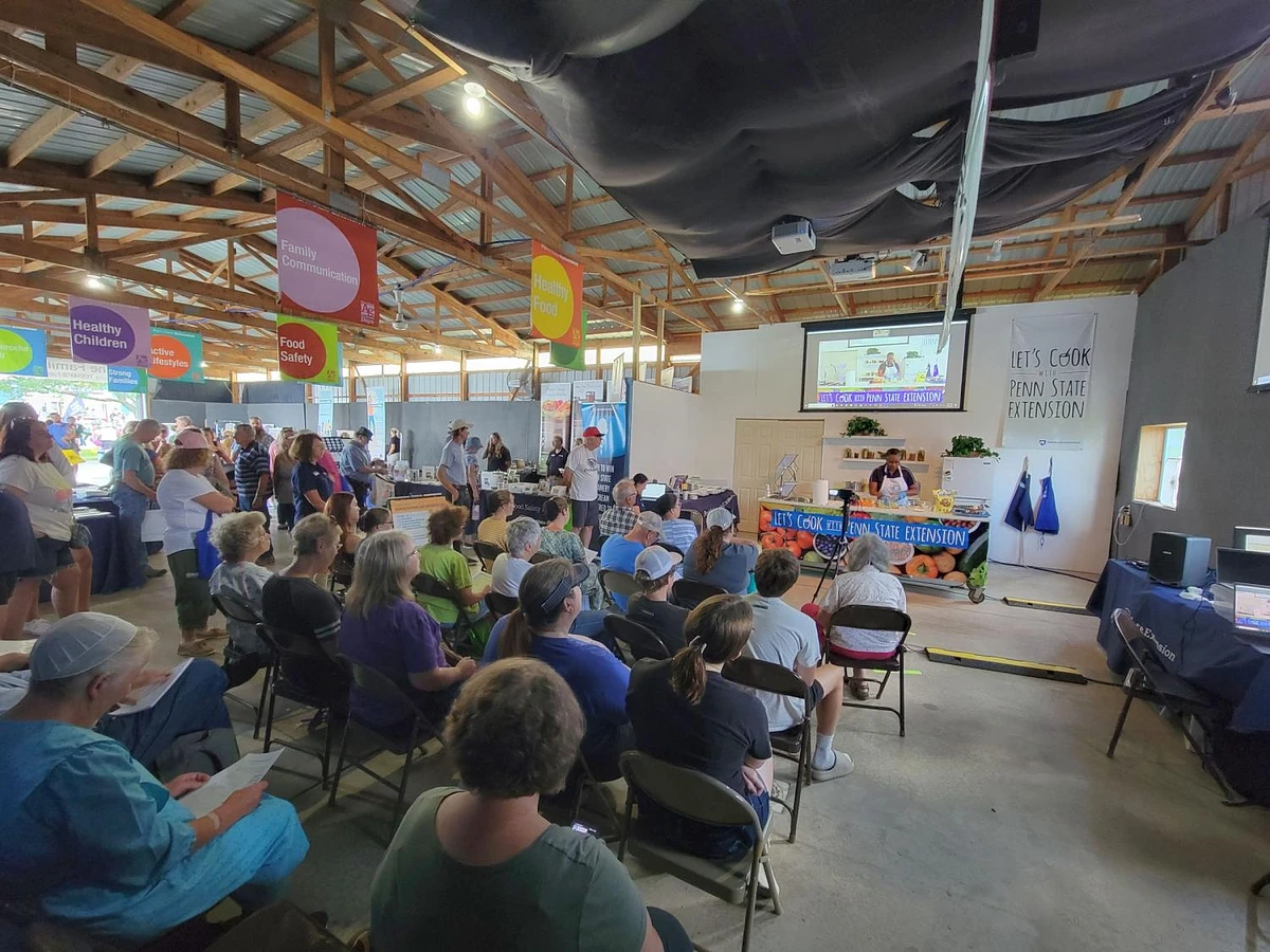 An audience watches a food demonstration by a Penn State Extension educator in the Family Room building at Ag Progress Days in 2023. Credit: Andy Hirneisen, Penn State Extension. All Rights Reserved.