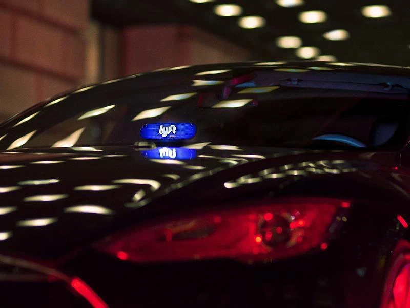 A picture of a car at night. 